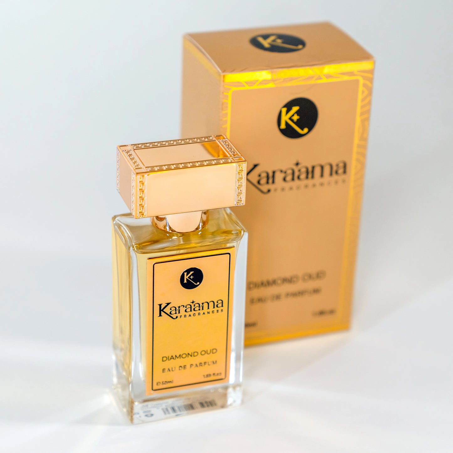 "Elegant Karaama perfume bottle with luxurious golden box packaging, showcasing the trending Diamond Oud Eau de Parfum – a popular, exquisite scent for a sophisticated allure."