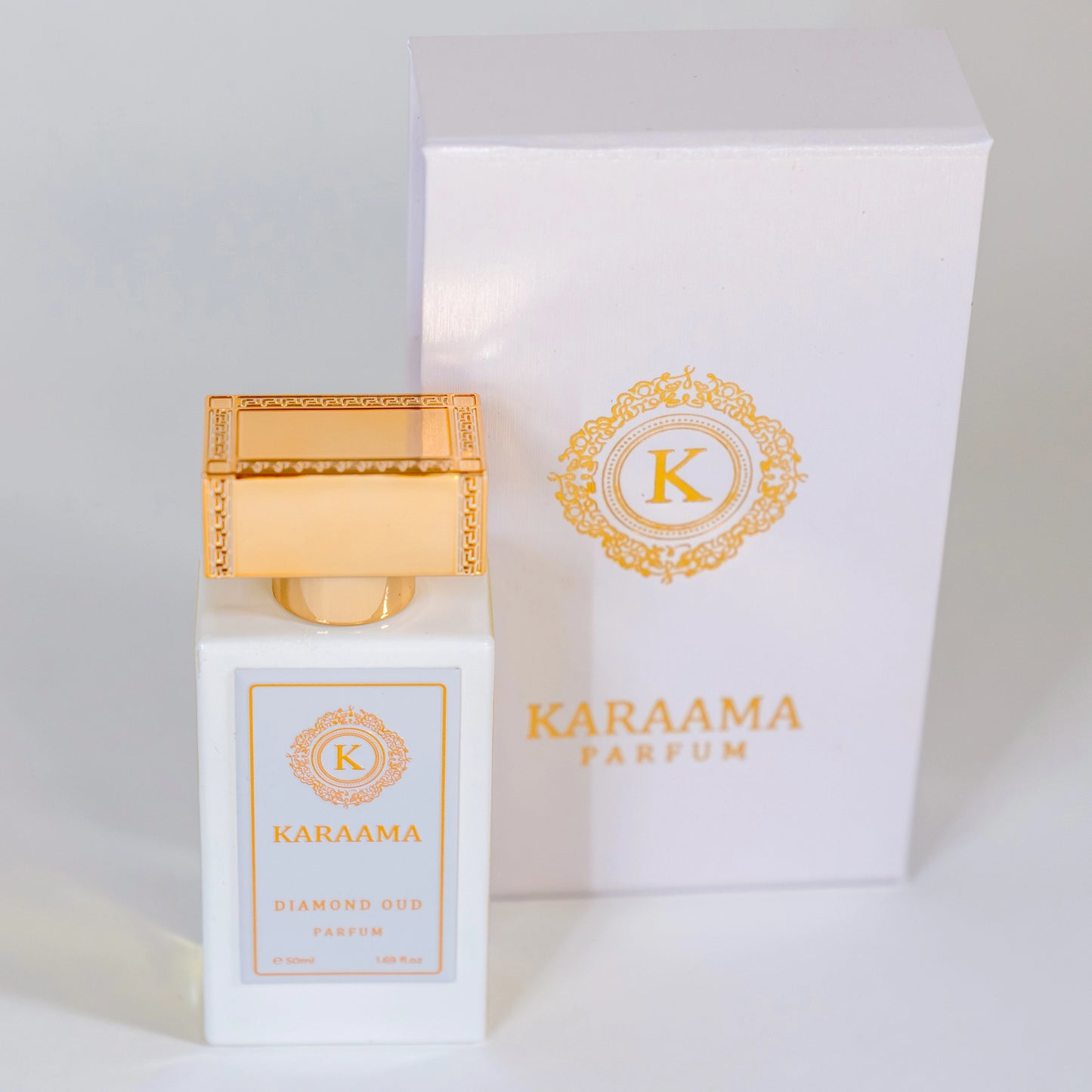 "Discover luxury with KARAAMA Parfum's Diamond Oud, a trending fragrance in an elegant, gold-accented bottle. Experience the allure of sophistication and style, showcased with its matching sleek packaging."