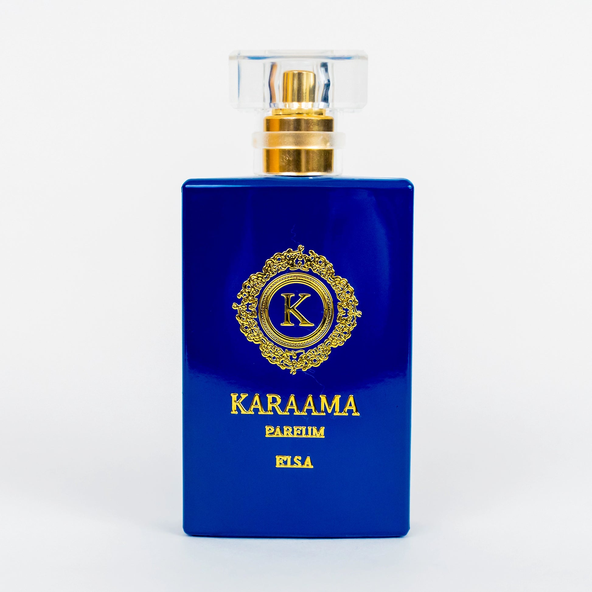 Elegant KARAAMA perfume bottle, featuring a rich blue hue and ornate golden detailing, exuding luxury and trendsetting style. Ideal for fragrance enthusiasts seeking a bold statement piece. #Perfume #LuxuryFragrance #FashionTrends #ScentGoals #StyleStatement