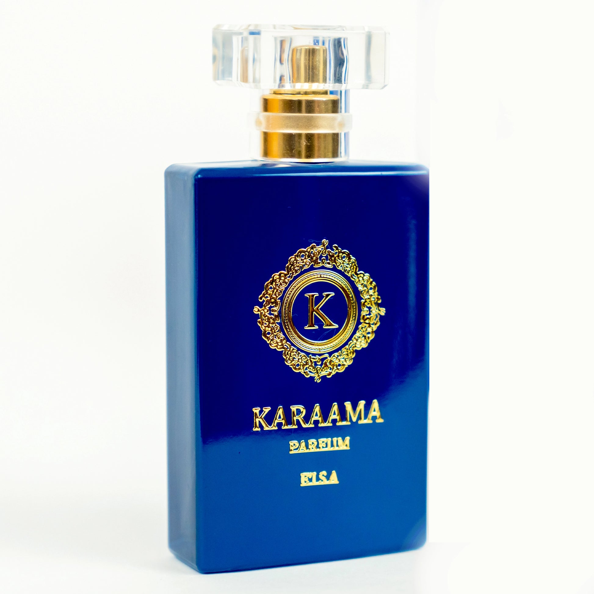 Elegant blue perfume bottle with golden detailing, showcasing the luxurious KARAAMA fragrance, isolated on a white background – perfect for sophisticated appeal. #Perfume #LuxuryScent #EauDeParfum #Style #BeautyTrend