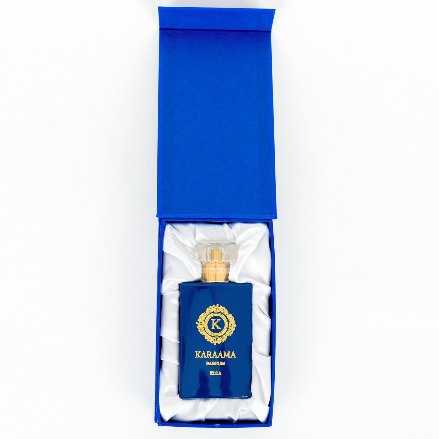 Elegant Karama perfume in a striking blue box with satin lining, showcasing luxury fragrance packaging trends, perfect for gifting. #LuxuryPerfume #GiftIdeas #ElegantPackaging