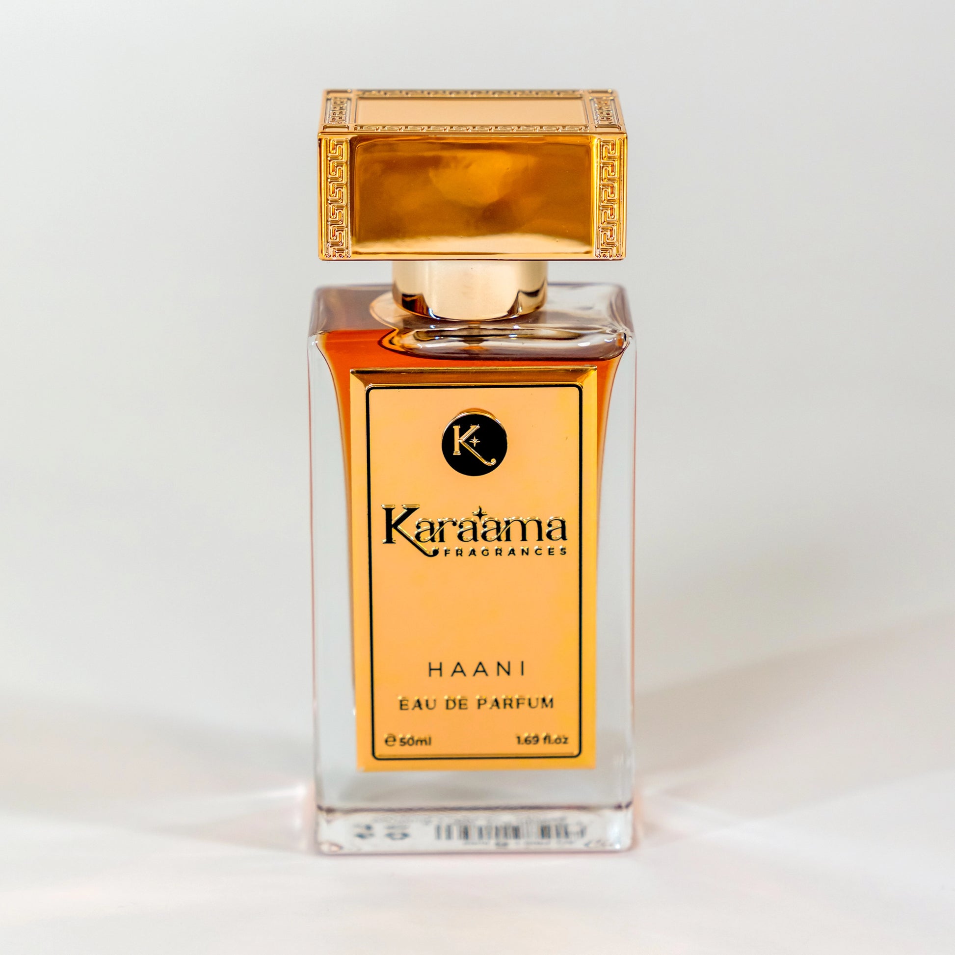 Elegant Karama Fragrances perfume bottle, model Haani, boasting a luxurious 50ml Eau de Parfum, is trending with its sophisticated, golden design - a must-have for scent enthusiasts.